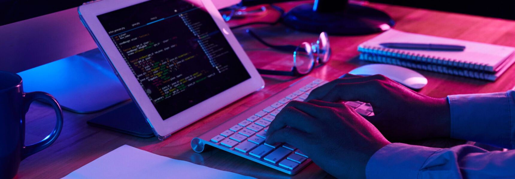 Freelance programmer Close-up image of programmer working at his desk in office